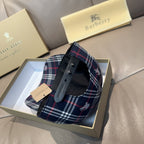 Plaid baseball cap with strap detail, navy with red and white check pattern.