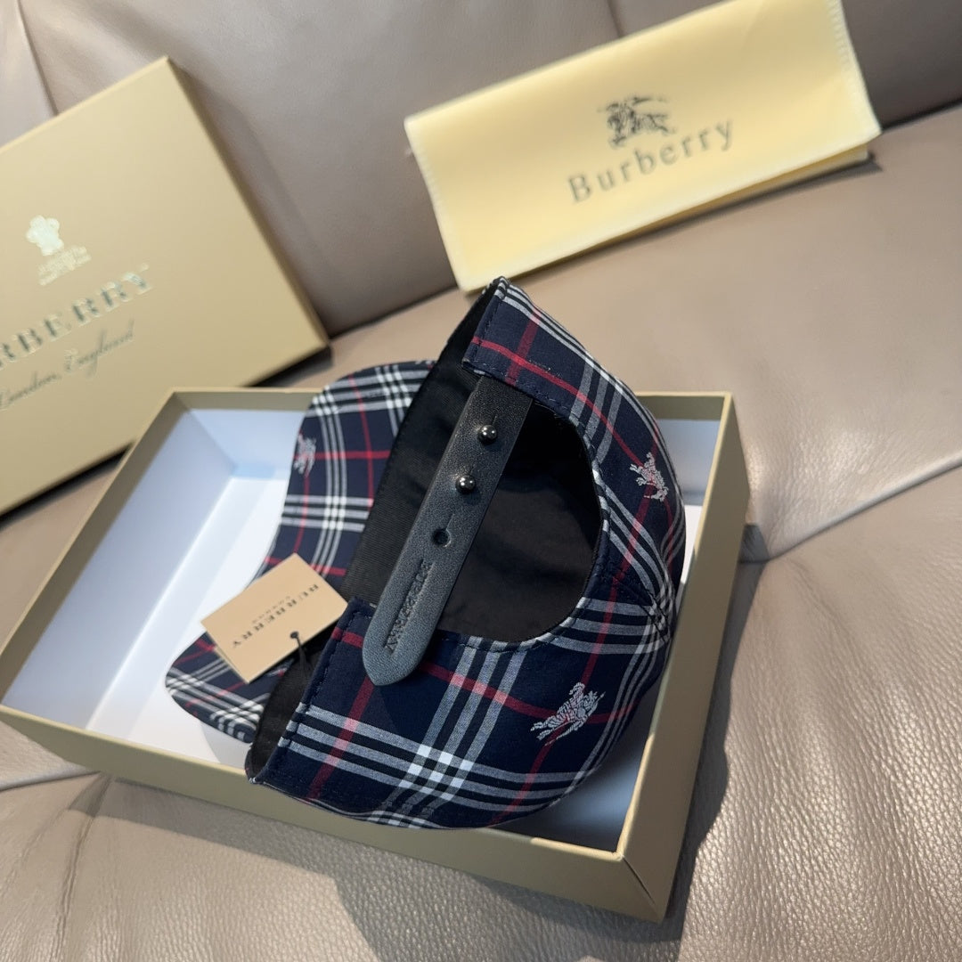 Plaid baseball cap with strap detail, navy with red and white check pattern.
