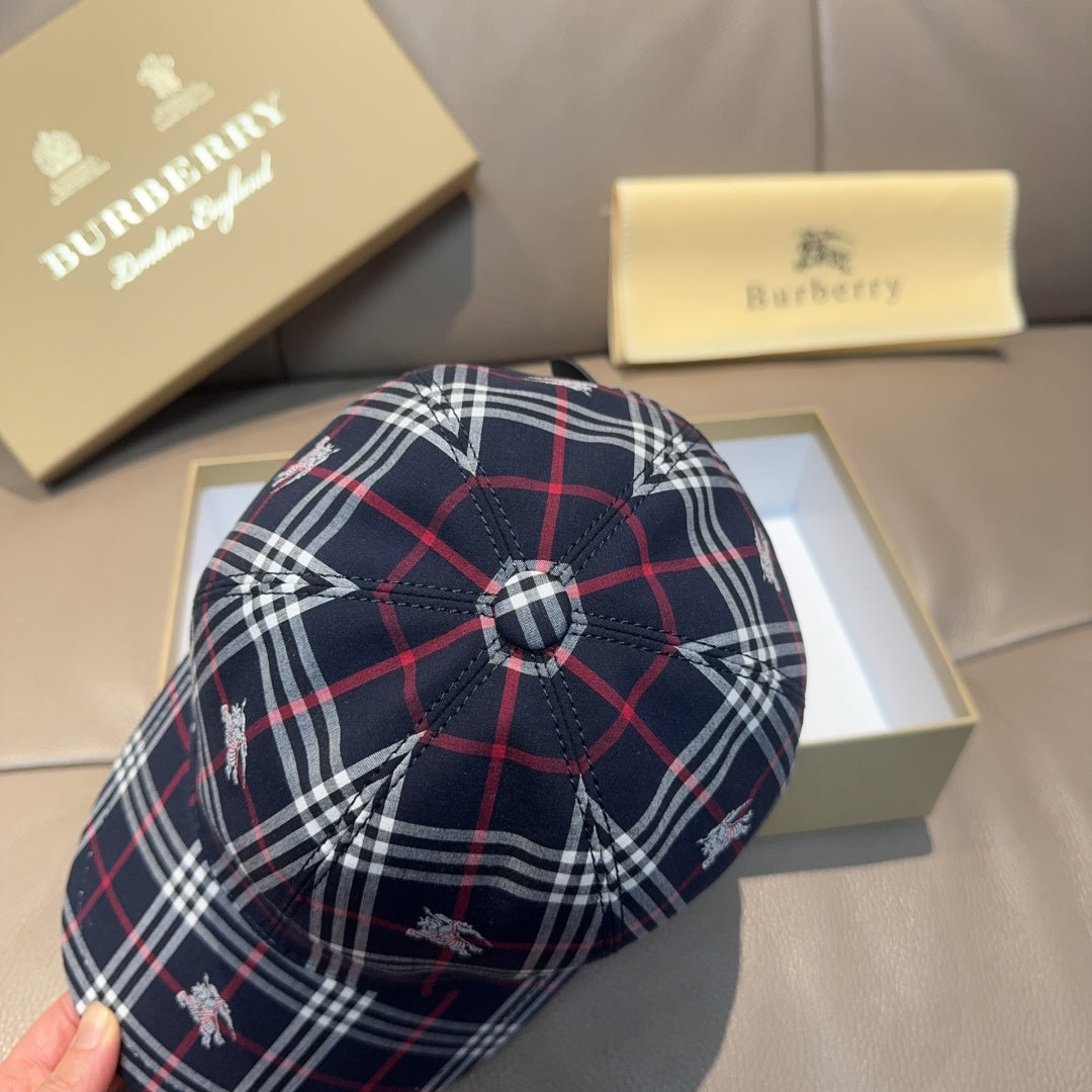 Plaid baseball cap in navy with red and white checks, stitched button at crown.