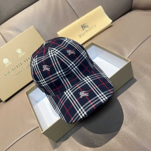 Plaid baseball cap in navy with red and white stripes, embroidered motifs on front.
