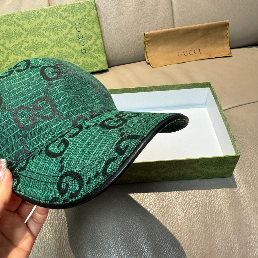 Gucci dark green cap with GG pattern, side profile and brim edge.