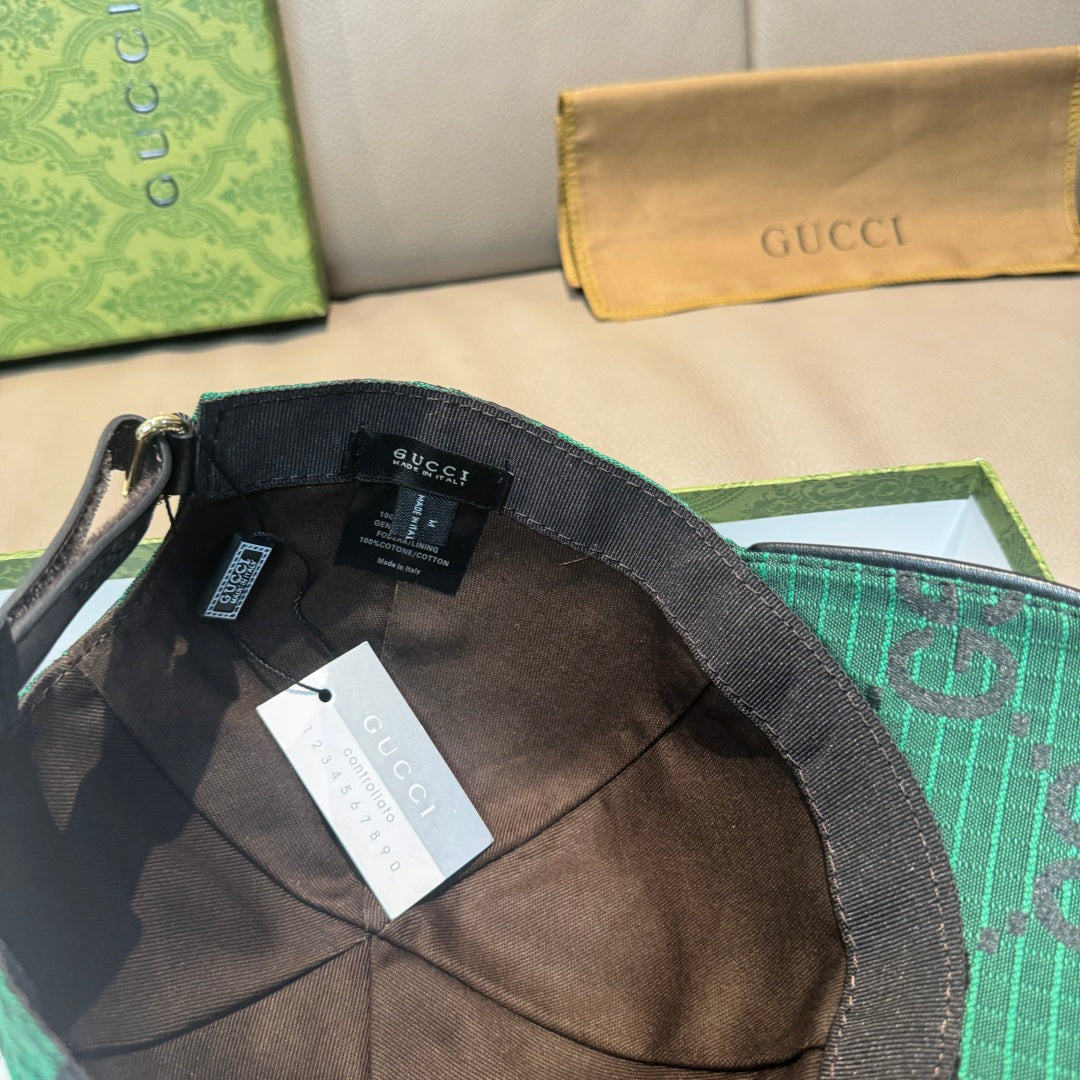 Gucci cap interior and lining with dark green GG-pattern exterior.