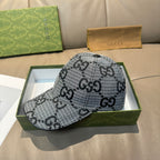 Grey GG-pattern baseball cap with curved brim and small button on top