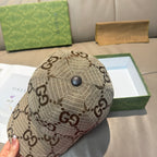 Beige GG monogram baseball cap with curved brim and black top button