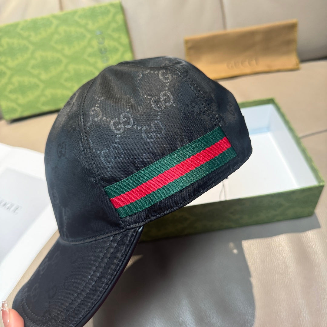 Gucci baseball cap, black GG-print with green-red-green stripe band near crown