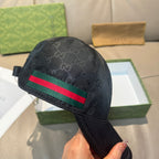 Gucci baseball cap, black GG-print with green-red-green stripe and side profile