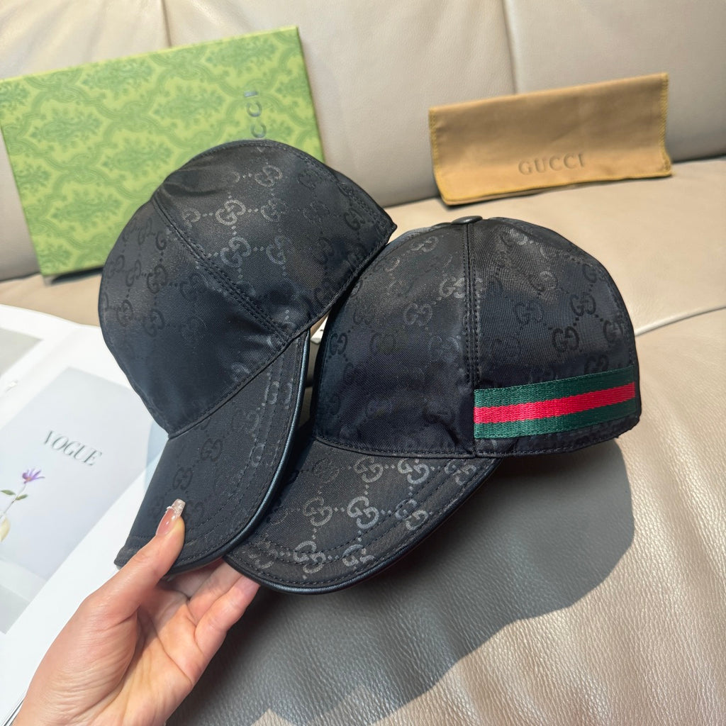 Gucci baseball cap pair, black GG-print caps with green-red-green stripe