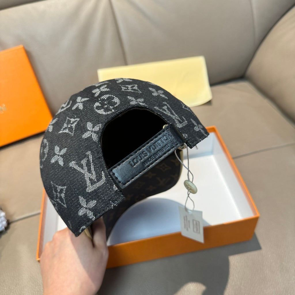 Louis Vuitton cap side view in dark monogram with strap tab