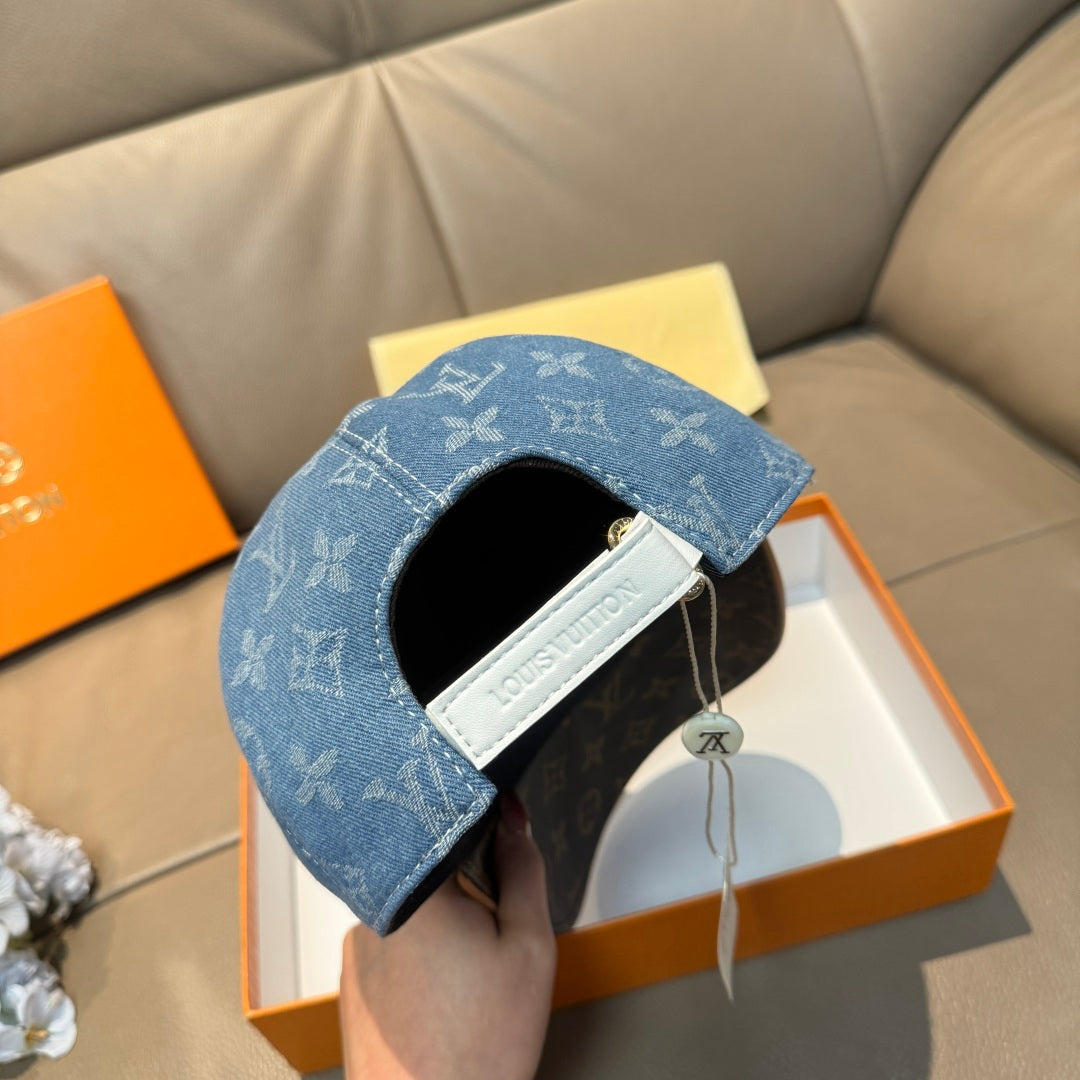Louis Vuitton cap folded with blue monogram exterior and black interior opening