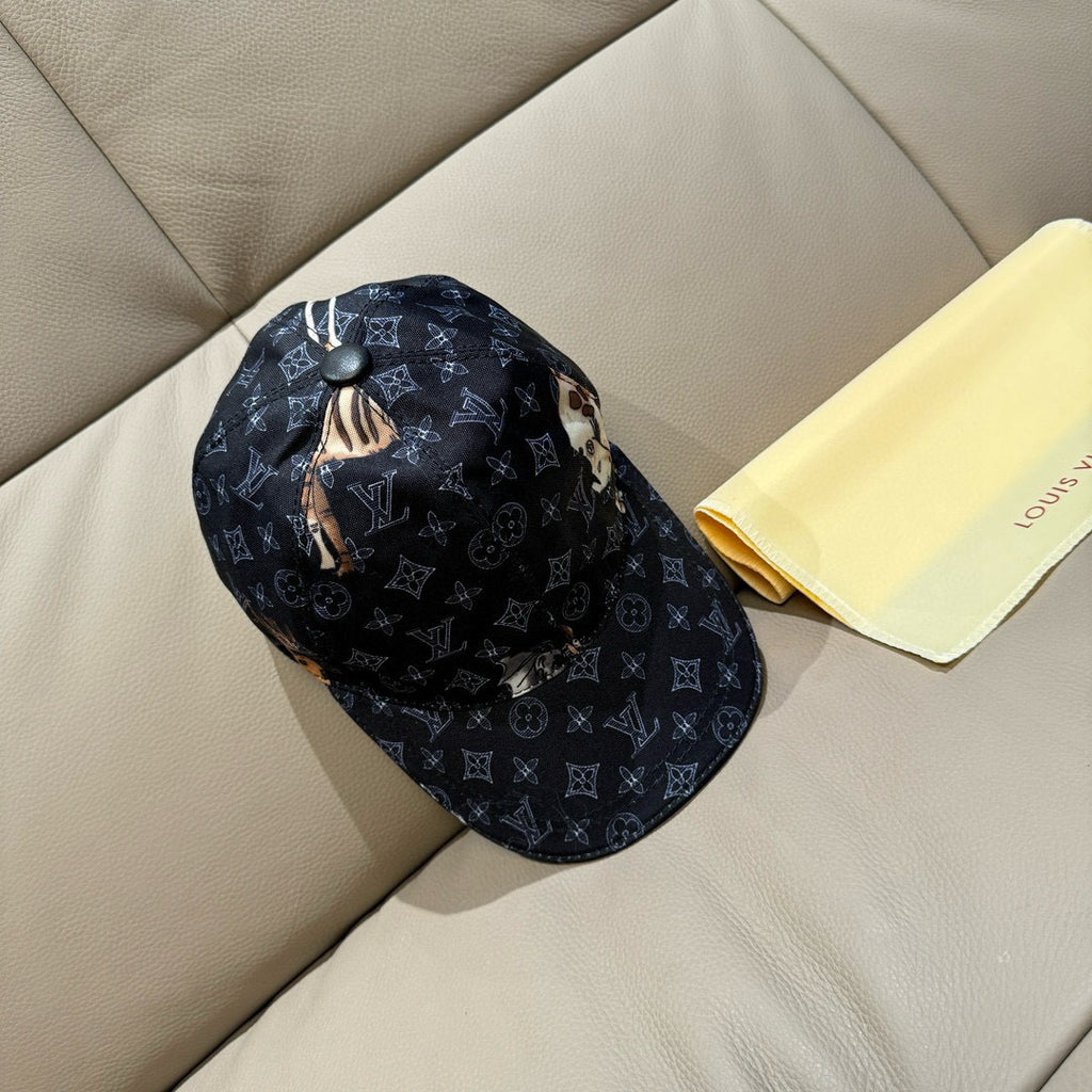 Louis Vuitton baseball cap in dark navy with allover monogram and animal motif at crown.