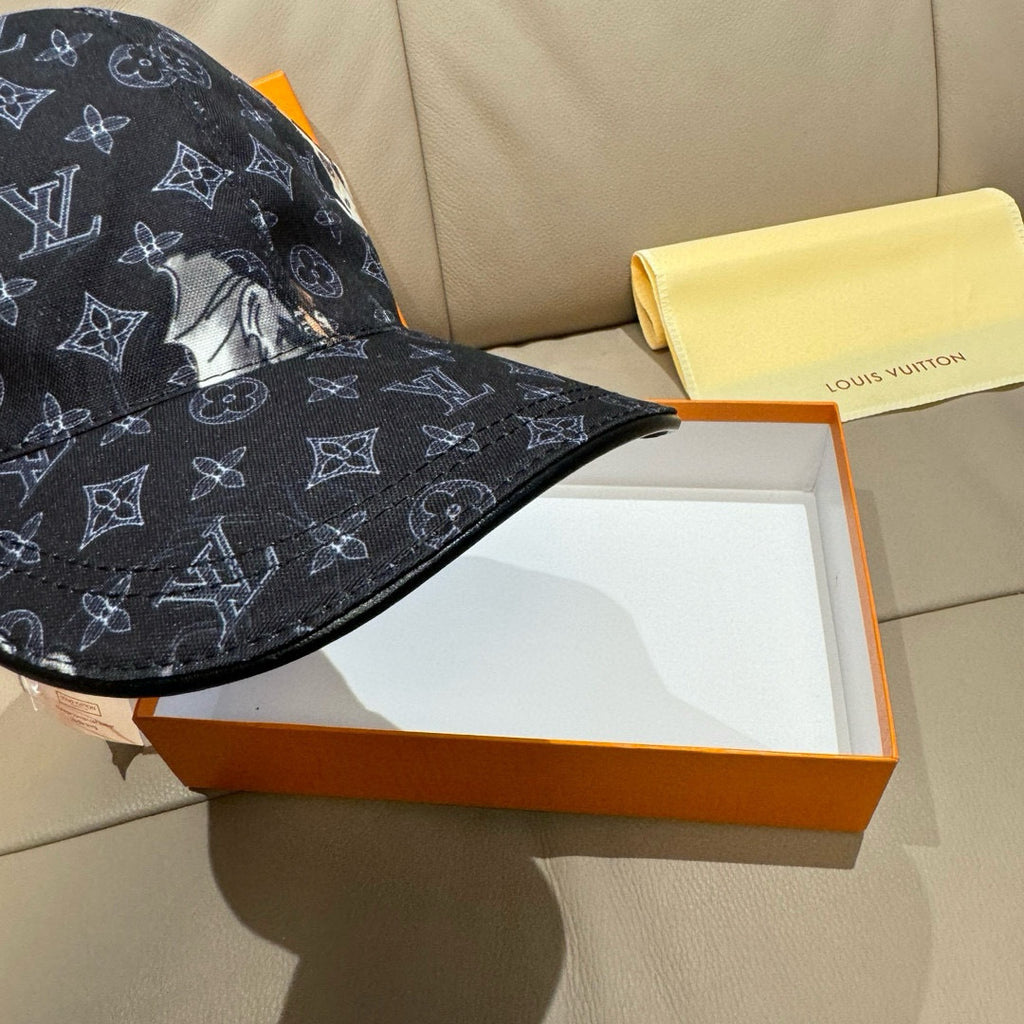 Louis Vuitton baseball cap in dark navy with monogram print and animal graphic near crown.