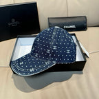 Chanel denim baseball cap with white dot pattern and interlocking CC logo stitching