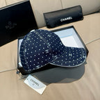 Chanel denim baseball cap with white dotted pattern and CC logos, front angle