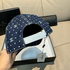 Chanel denim baseball cap with white dot print and CC logos, adjustable strap detail
