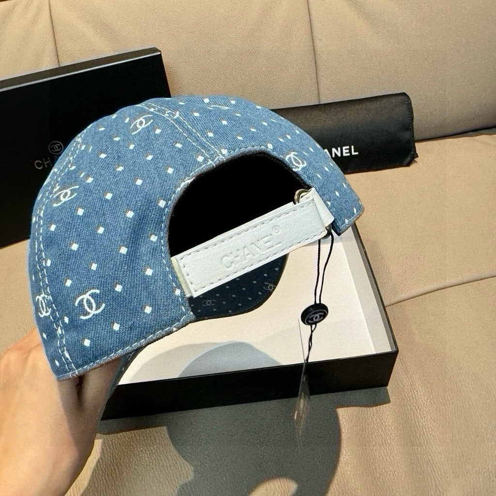 Blue denim baseball cap showing inside strap and white label on visor