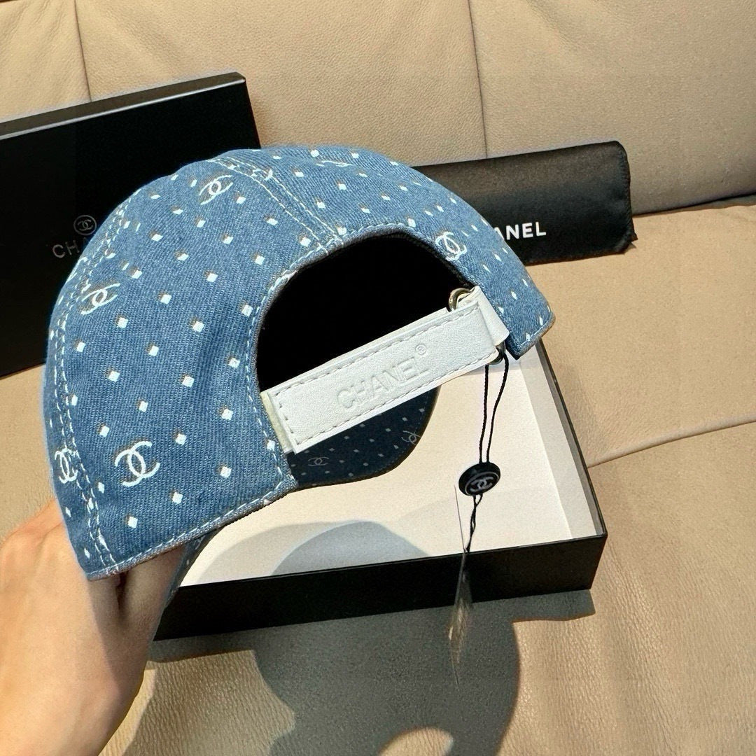 Blue denim baseball cap showing inside strap and white label on visor