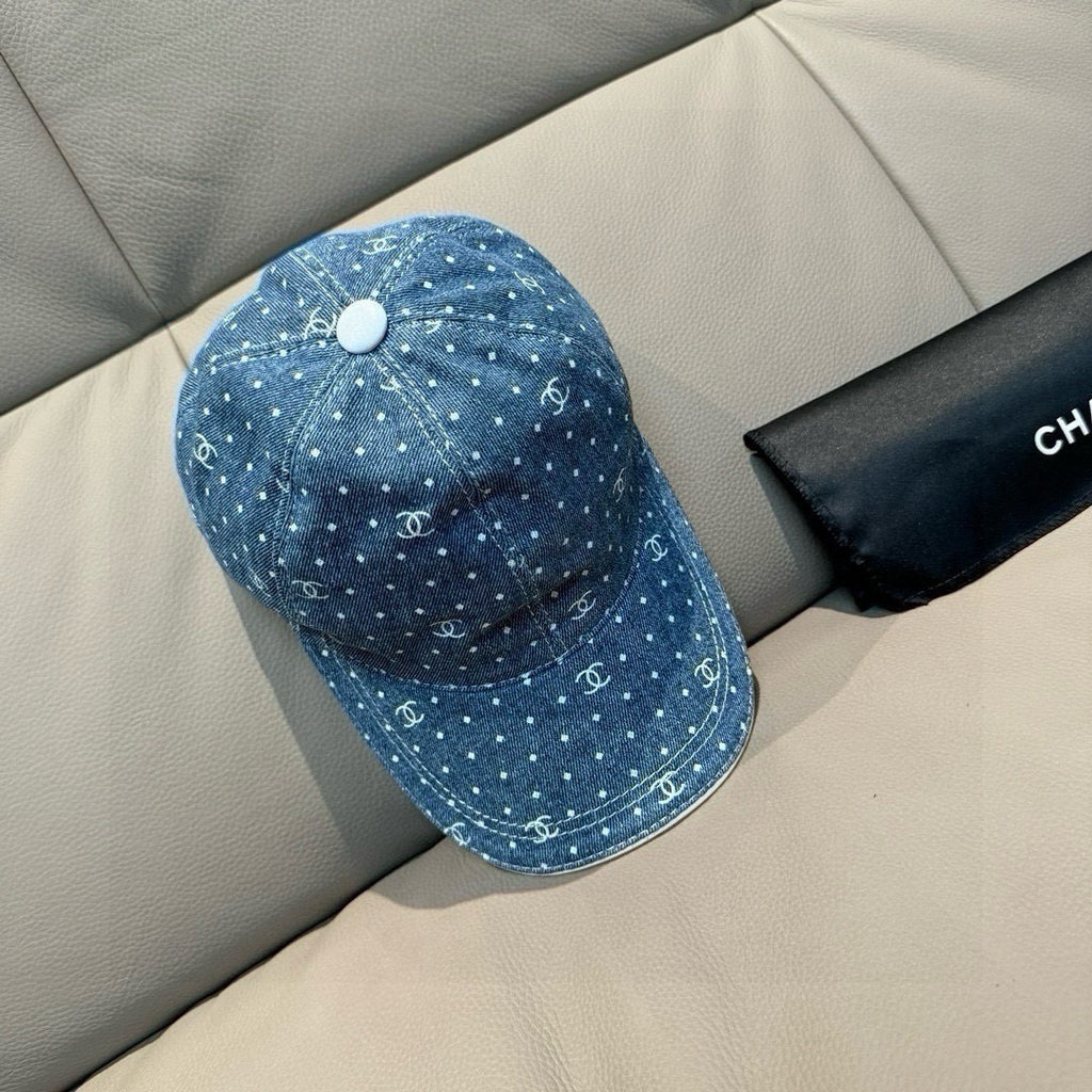CHANEL blue denim cap with white dot CC logo pattern and small top button