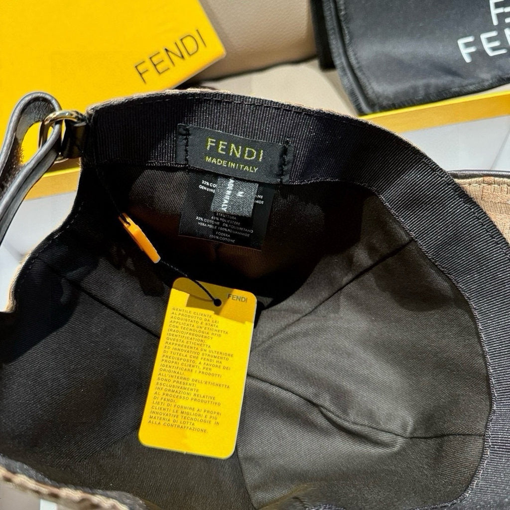 Black cap interior lining with FENDI tag and care label