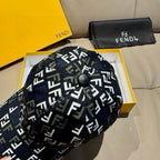 Fendi logo cap in dark navy with FF pattern, crown close-up with button