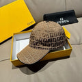 Tan logo baseball cap with curved brim and crown button