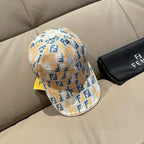 Fendi baseball cap with white FF monogram pattern in blue and yellow, curved brim