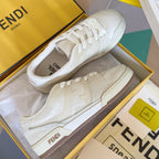 Cream low-top sneakers with lace-up front and FENDI logo on side
