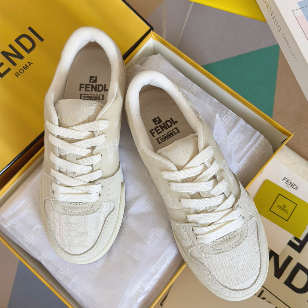 Cream low-top lace-up sneakers with FENDI logo on tongue and side panels