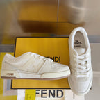 Cream low-top lace-up sneakers with FENDI logo on side and tongue