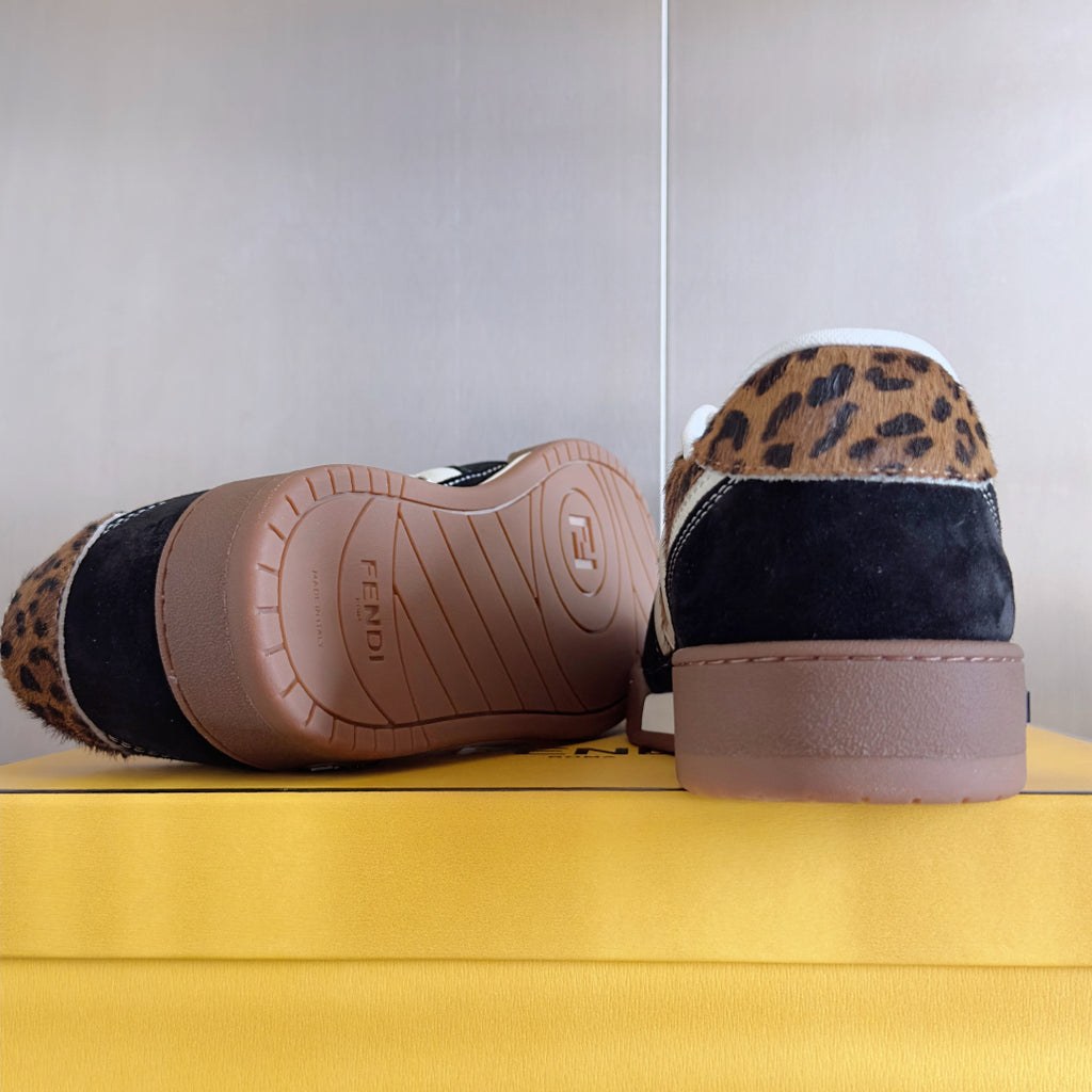 Fendi unisex sneaker outsole view: tan-brown rubber sole with tread pattern