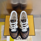 Pair of unisex Fendi sneakers with white laces, leopard print panels, and navy toe caps