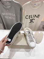 Golden Goose sneakers with textured rubber sole, white leather upper and gray laces
