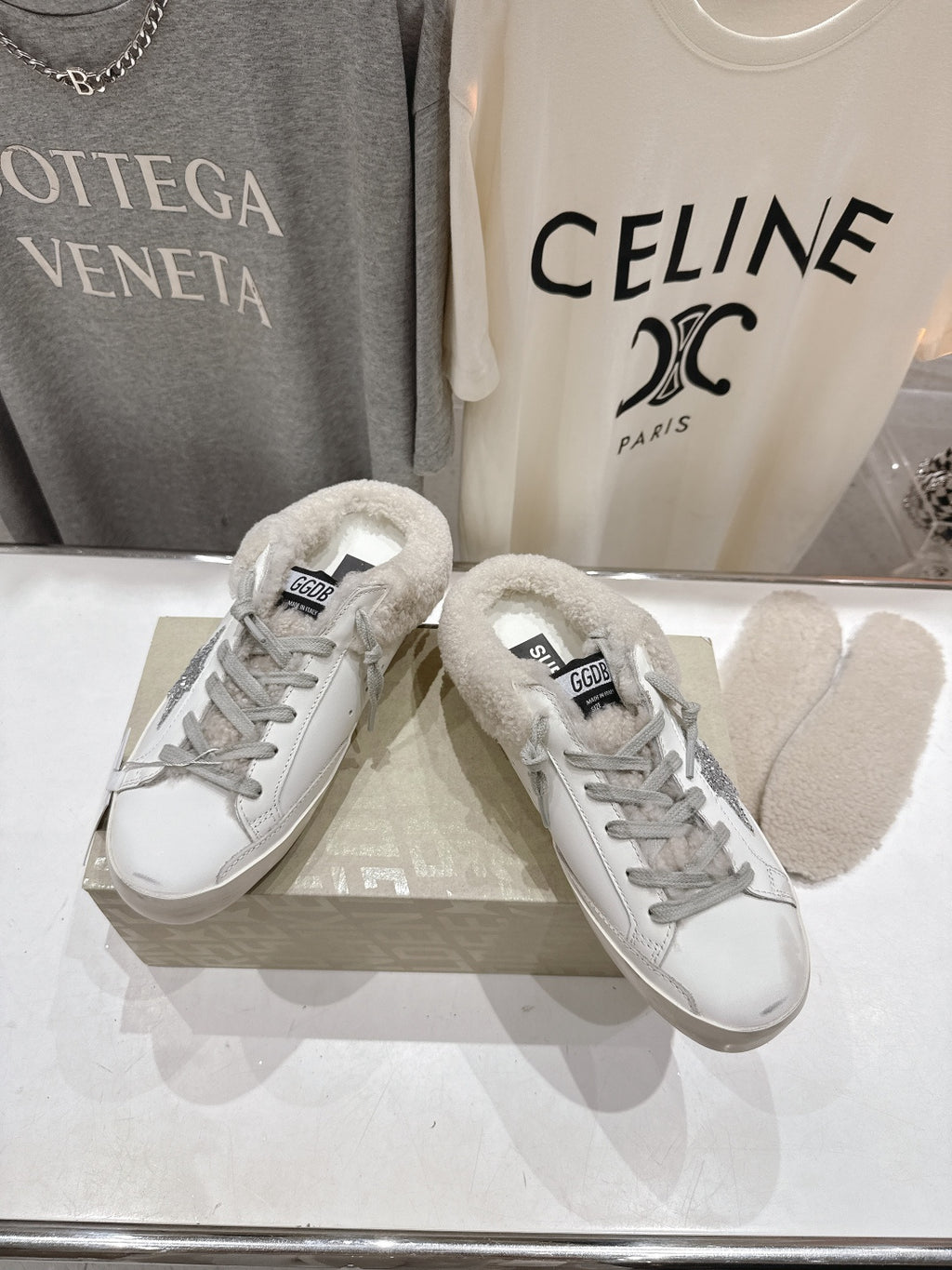 Golden Goose low-top sneakers in white with lace-up, gray glitter detail, plush lining