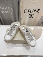 Golden Goose low-top sneakers in white with lace-up, gray glitter detail, plush lining