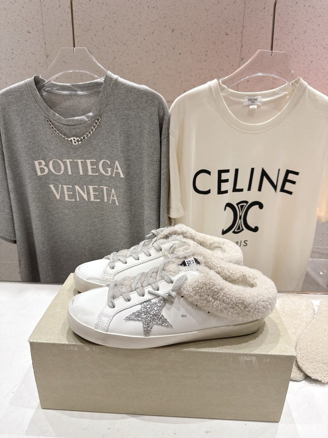 Golden Goose white sneakers with gray glitter accent and shearling collar lining