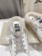 Golden Goose sneakers heel view, fuzzy collar with black-and-white tongue label