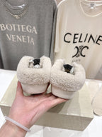 Golden Goose sneakers from side, plush shearling collar with gray glitter and black tags