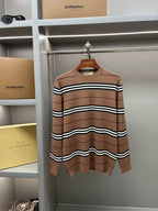 Brown striped knit sweater with crew neck and black-and-white wavy stripes
