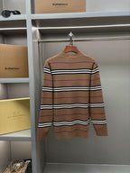 Brown striped knit sweater with crew neck and long sleeves