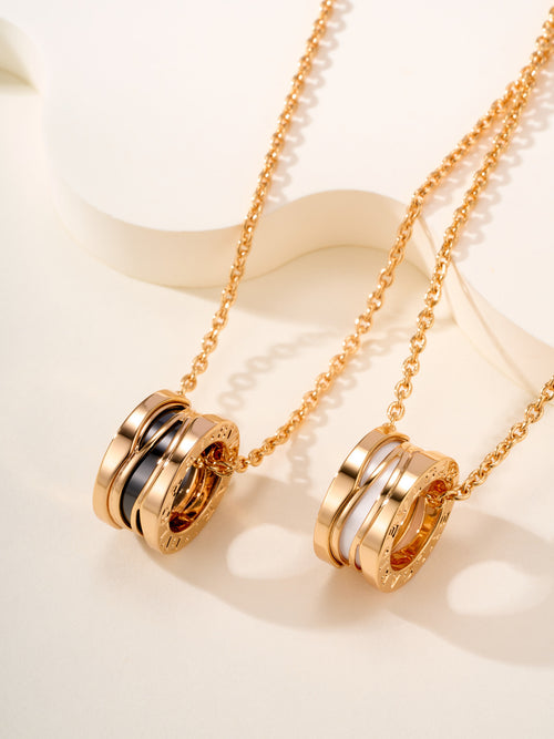 Bvlgari gold-tone pendant necklace with stacked ring charms on chain