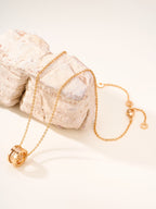 Bvlgari gold-tone pendant necklace with two ring charms and chain
