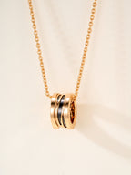 Bvlgari gold-tone pendant necklace with central stacked ring charm