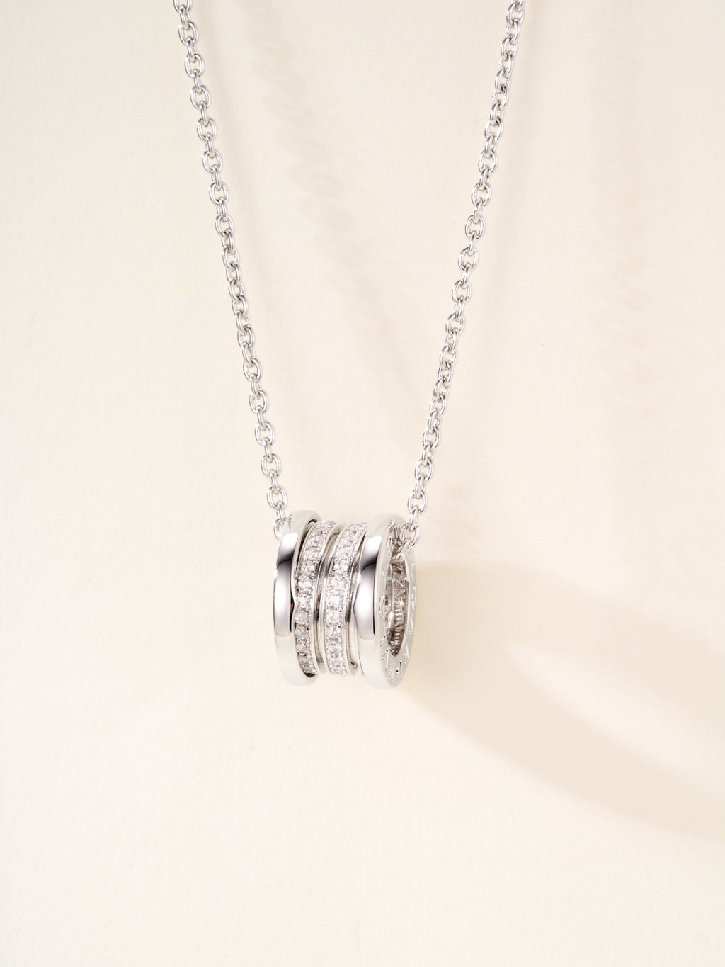 Bvlgari silver necklace with faceted circular disc pendant
