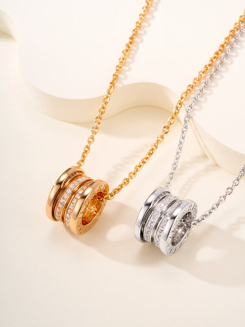 Bvlgari necklace set with gold and silver circular disc pendants