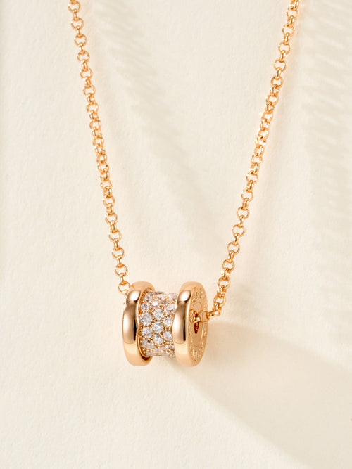 Gold necklace with pavé cylinder charm and linked chain
