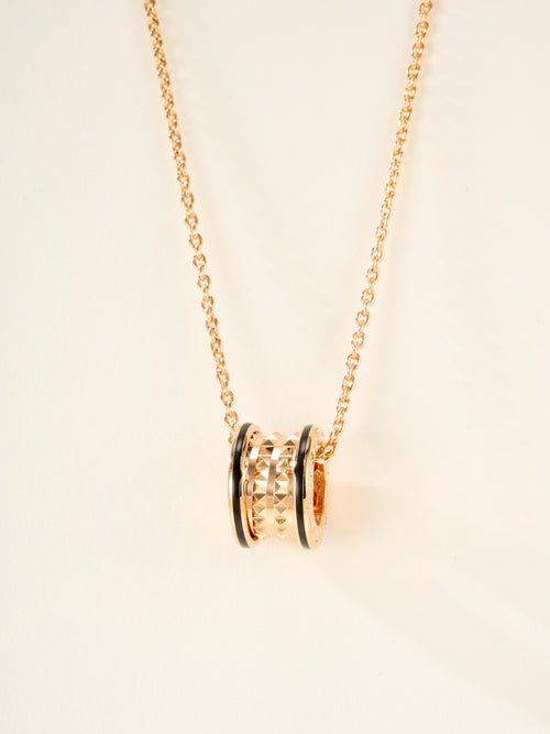 Bvlgari gold-tone necklace with cylindrical pendant and enamel accent rings