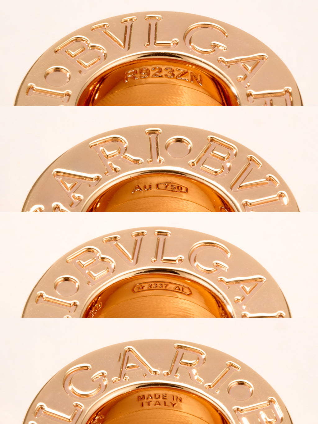 Gold-tone ring pendant close-up with engraved letters around the bezel