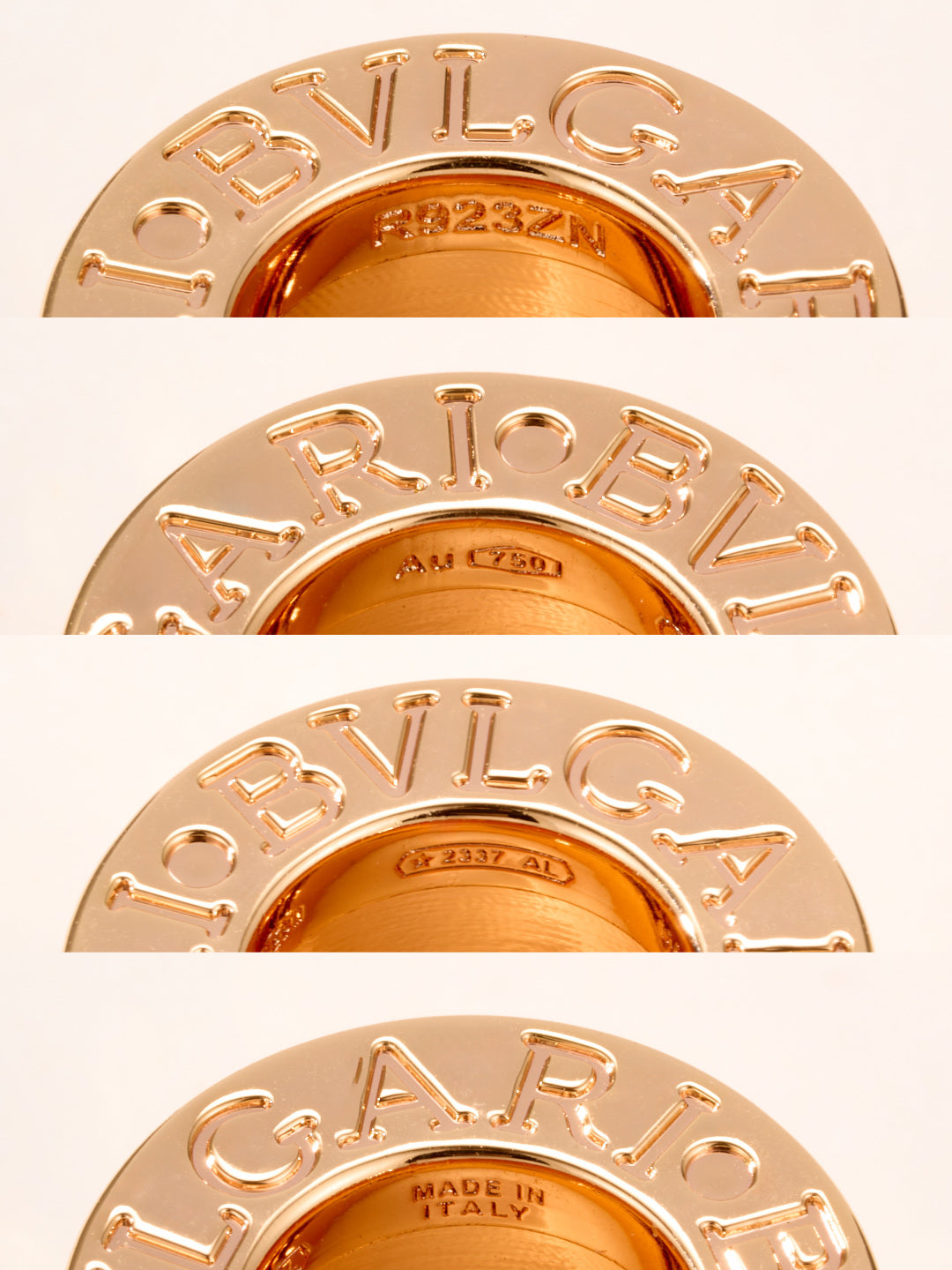 Gold-tone ring pendant close-up with engraved letters around the bezel