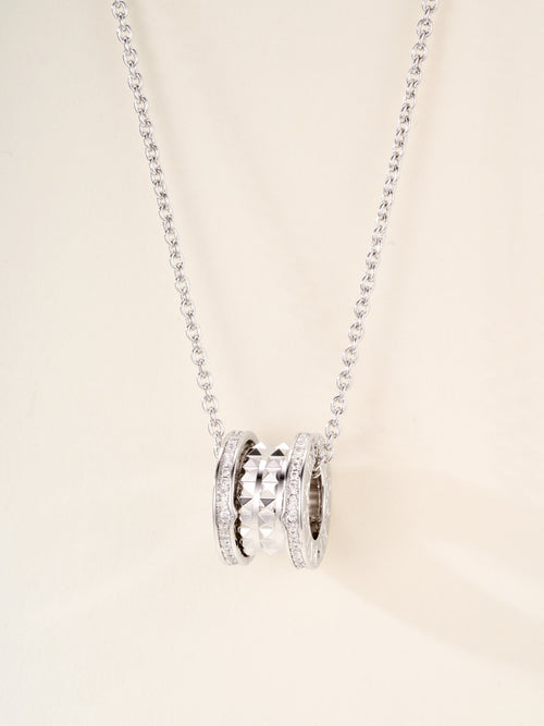 Silver-tone necklace with double-ring pendant and small pavé stone detailing