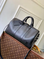 Louis Vuitton men’s dark blue leather bag with top handles and front buckle strap