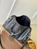 Louis Vuitton men’s dark blue leather bag with front buckle straps and zip opening